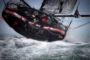 French skipper Jeremie Beyou sails his Imoca 60 monohull "Charal" few nautical miles before crossing the finish line placed 13th, of the Vendee Globe round-the-world solo sailing race off the coast of Les Sables-d'Olonne, western France, on February 6, 2021. (Photo by LOIC VENANCE / AFP)