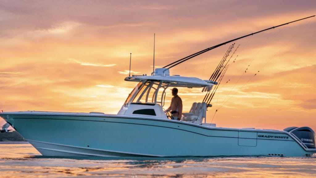 OneWater Marine boat on the water at sunset