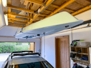 Barton Marine skydock lifts canoe to store in garage