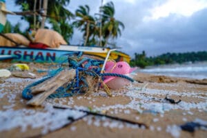 Marine litter with plastic nurdles on a beach in Sri Lanka