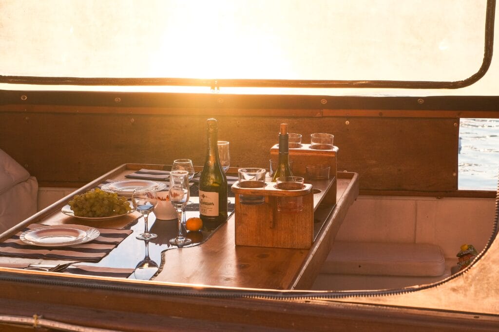 Drinks on a boat deck at sunset