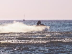 jetski with boat in background