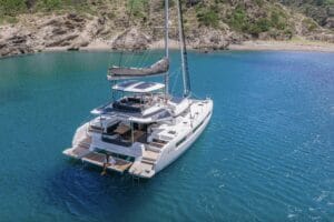 Lagoon catamaran anchored in blue waters