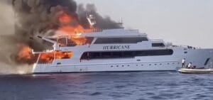 white motor yacht on fire