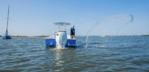 cox marine engine on sportsfishing boat on the water