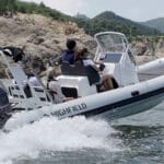 White Highfield RIB boat on the water