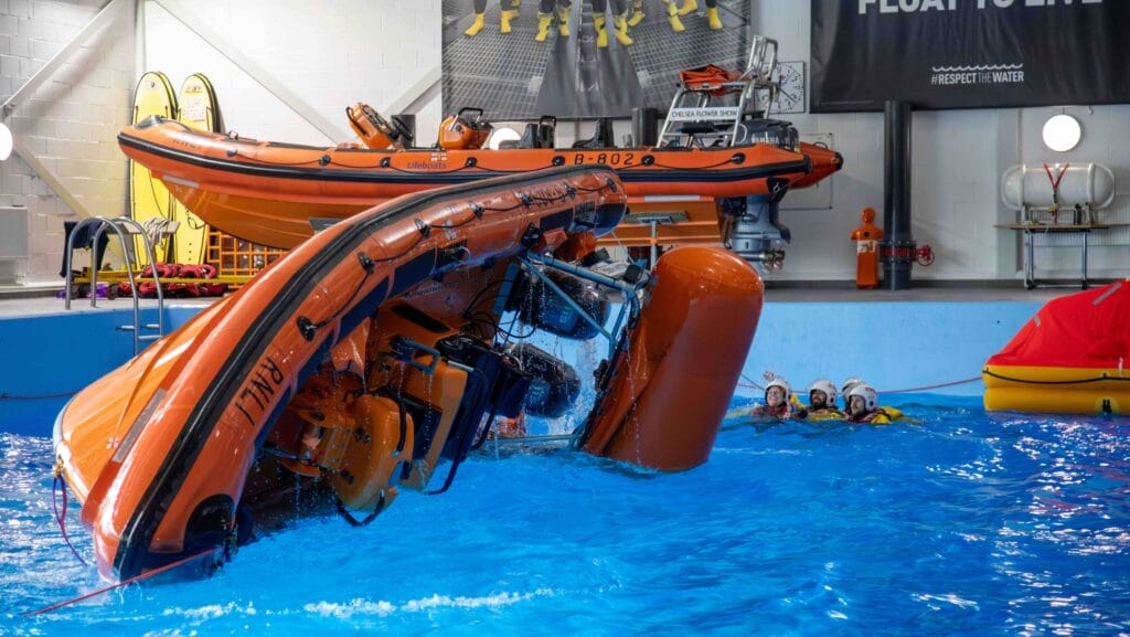 lifeboat being tested in a swimming pool