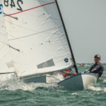 A sailor in a boat with a lot of sail showing . . . the type which Sustainable Sailing says it has found a way to recycle.