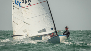 A sailor in a boat with a lot of sail showing . . . the type which Sustainable Sailing says it has found a way to recycle.