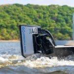 ePropulsion electric motor in the water at back of boat