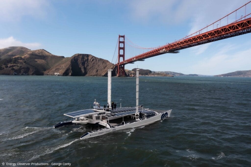 Catamaran Energy Observer by Gold Gate bridge