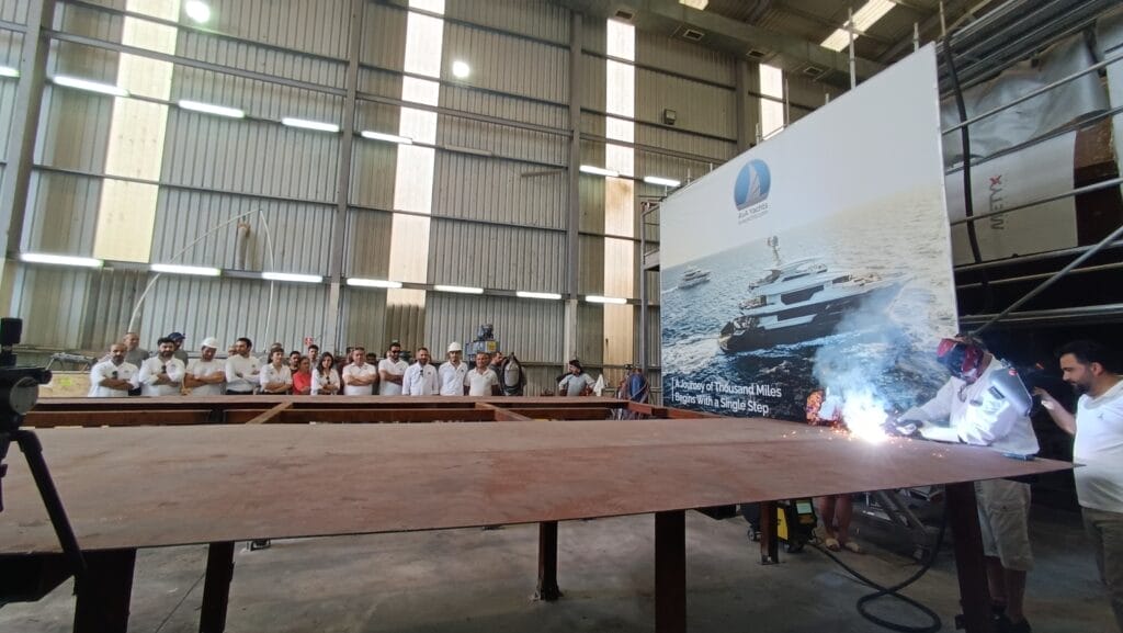 Team watches as specialist starts work on Kando85