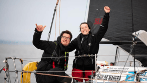 Carlos Manera Pascual and Rebecca Coles celebrate second place in Mini Fastnet Race