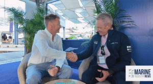 men shake hands after discussing Sanctuary Cove International Boat Show's (SCIBS) successes
