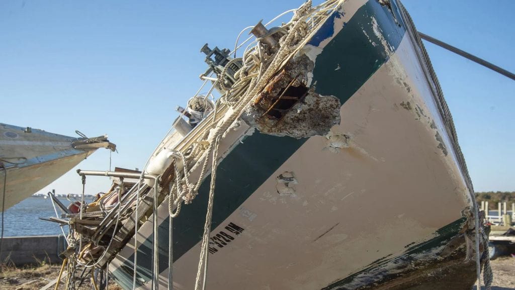 Derelict concrete sailboats await transfer to the landfill on the TowBoatUS lot. BoatUS Foundation NOAA Grant to remove derelict vessels and fishing nets from Beaufort Harbor in Beaufort, North Carolina. November 2018 working with TowBoatUS Beaufort - photo © BoatUS Foundation