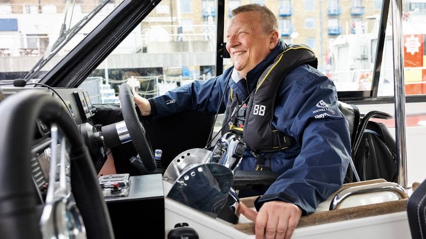 Geoff Holt in the driving seat of his WetWheels boat