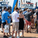 People milling around on a pontoon at Seawork, the commercial boat show in Southampton