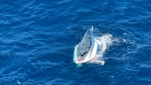 The overturned yacht off Lady Elliot Island. Supplied by RACQ LifeFlight Rescue