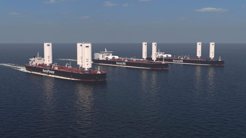 Cargo ships in a row with rigid sails for wind propulsion