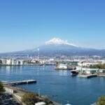 View of Mount Fuji with marina in the foreground.