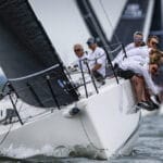 Men sailing on a J class yacht