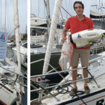 man on sail boat holding the Turbino - a new underwater microplastics collecting vacuum system