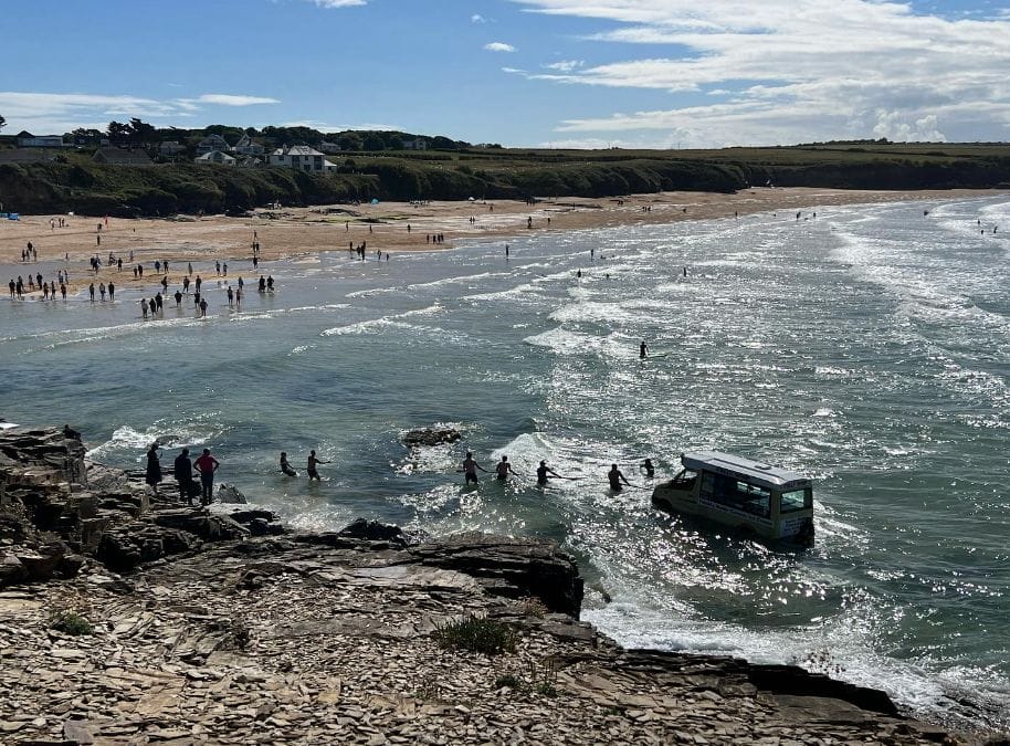 people try to drag in ice cream van swept out to sea in Cornwall