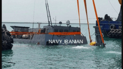 Iranian Navy's Sahand destroyer frigate sinks in Iran port and is shown being lifted in sling