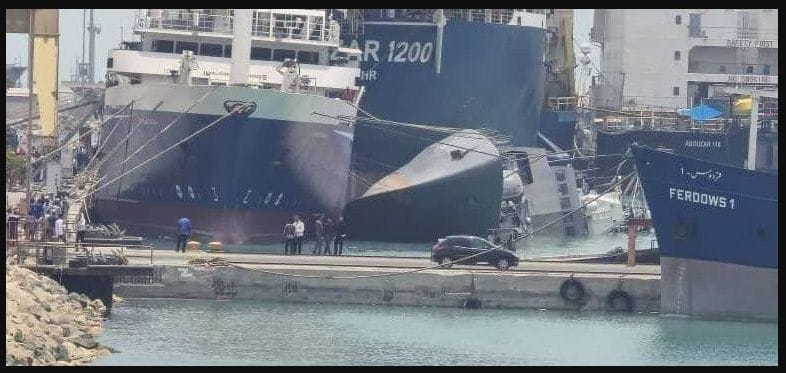 Iranian Navy's Sahand destroyer frigate sinks in Iran port. Ship lies on side next to other vessels