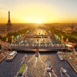 an artist's aerial impression of what the Paris Olympics opening ceremony will look like with people lining the banks of the Seine and boats meandering