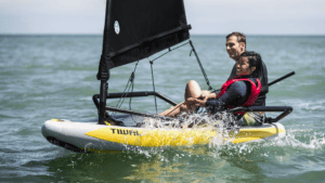 Two sailors onboard Tiwal inflatable sailboat / dinghy