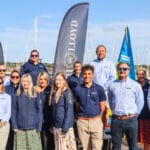 group of people in front of pontoons