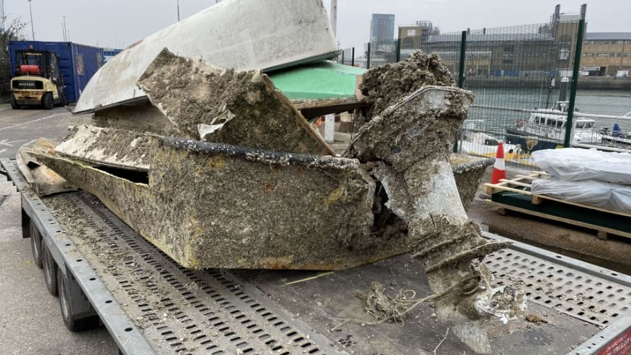 Abandoned boat on trailer. Fibreglass boats are disintegrating in sea causing glass to entre human food chain via seafood