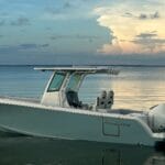 White outboard inshore fishing leisure boat