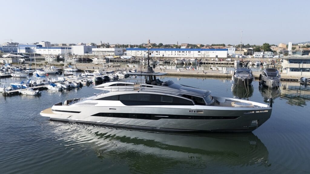 grey and black motor yacht launched in shipyard