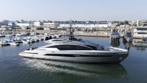 grey and black motor yacht launched in shipyard