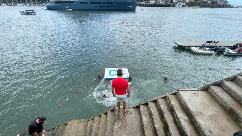 harbour steps and people in water in Dartmouth UK