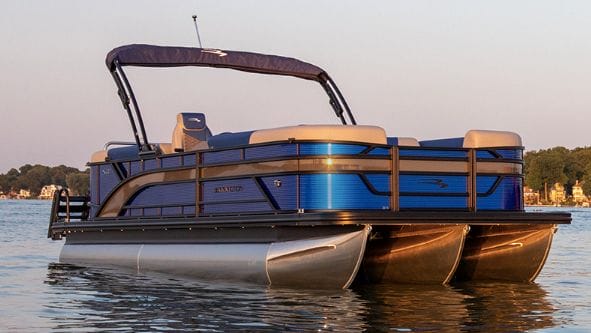 Pontoon boat in blue from Bennington which has expanded its dealer network