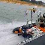 View of back of drug smuggler in boat fleeing from Border Force