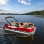 pontoon boat on US lake with gorup onboard