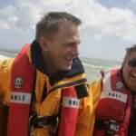 Daniel Craig in RNLI boat with crew