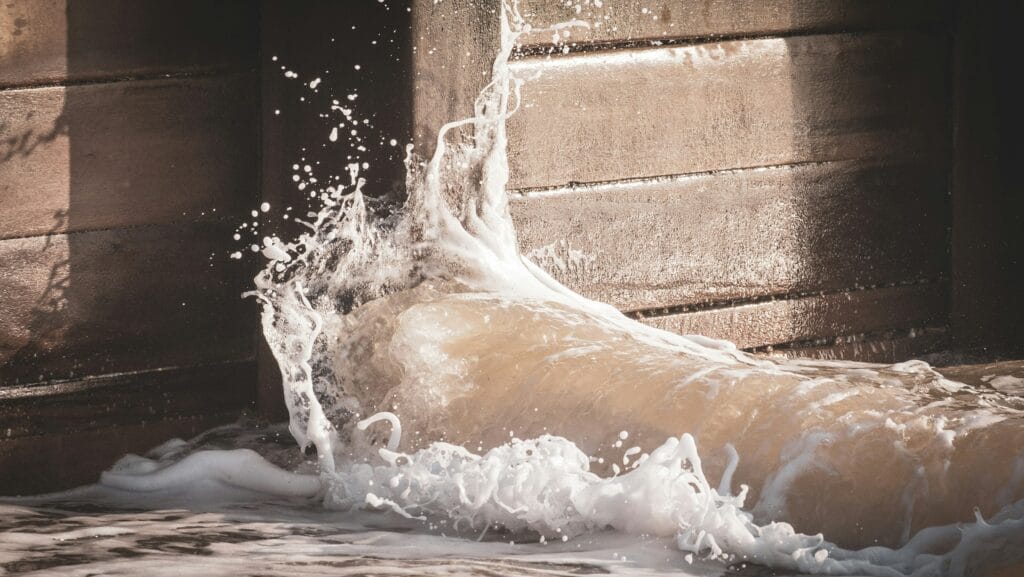 Breaking waves against a wall in Southwold.