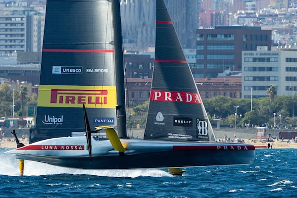 America's Cup Luna Rossa AC75 foiling race boat in flight