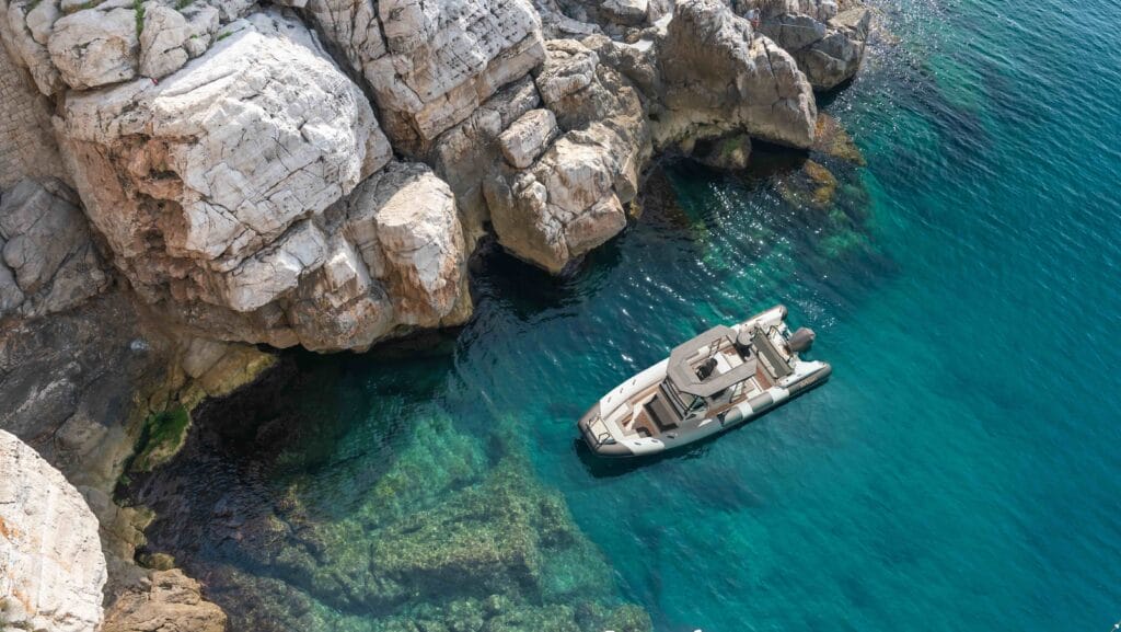 aerial view of RIB in crystal clear waters