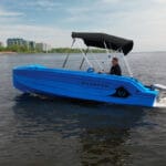 A blue boat on the water