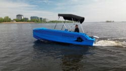 A blue boat on the water