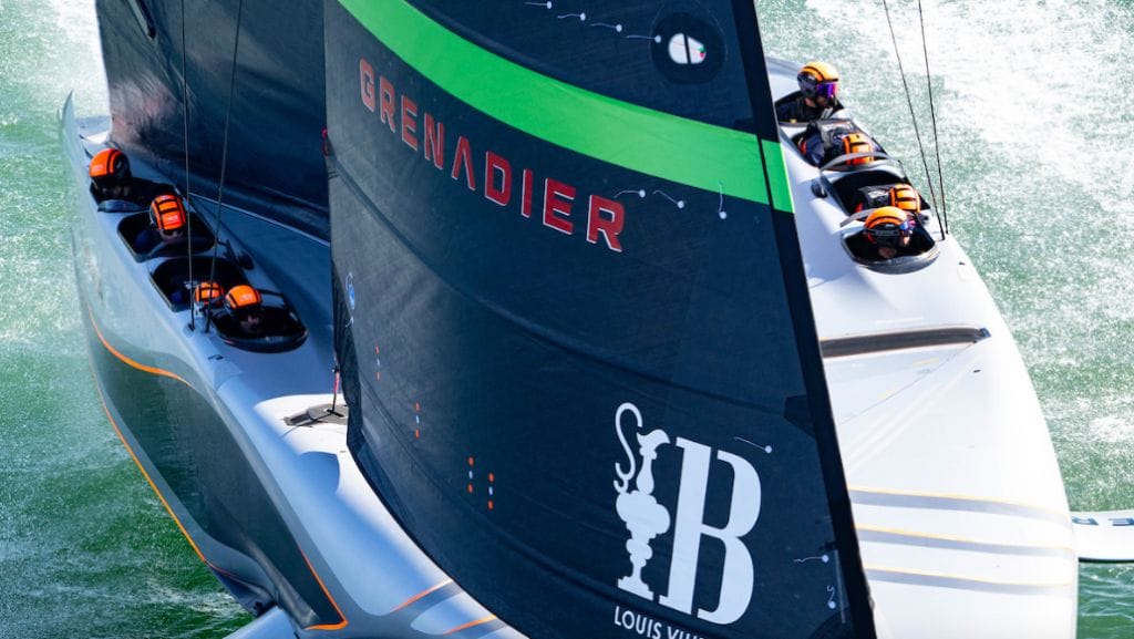 Aerial view of America's Cup INEOS boat shows team members and sails