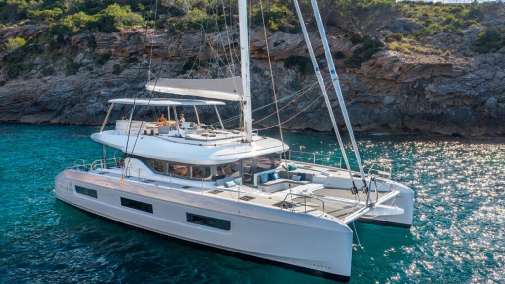 large luxury white catamran in bay