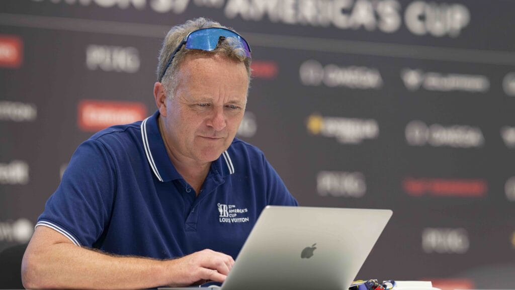 Magnus Wheatley - author of There is no Second book about America's Cup - looks at his laptop