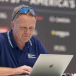 Magnus Wheatley - author of There is no Second book about America's Cup - looks at his laptop